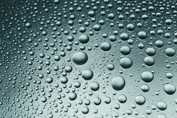 Water drops on grainy surface