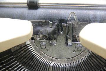 Typewriter is a device used to print letters on paper before the ancient technology. Used in business