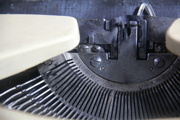 Typewriter is a device used to print letters on paper before the ancient technology. Used in business