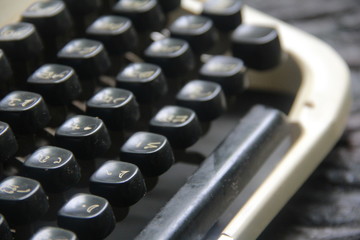 Typewriter is a device used to print letters on paper before the ancient technology. Used in business