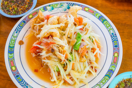 Papaya salad or what we called in Thai "Som Tum" the popular Thai style local the eastern delicious food of Thailand.
