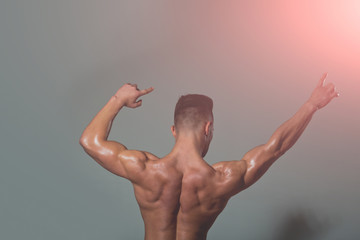 Plakat sexy man with muscular body and back