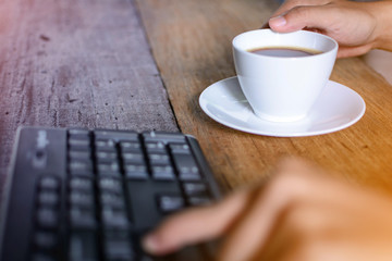 coffee cup clock and work on table