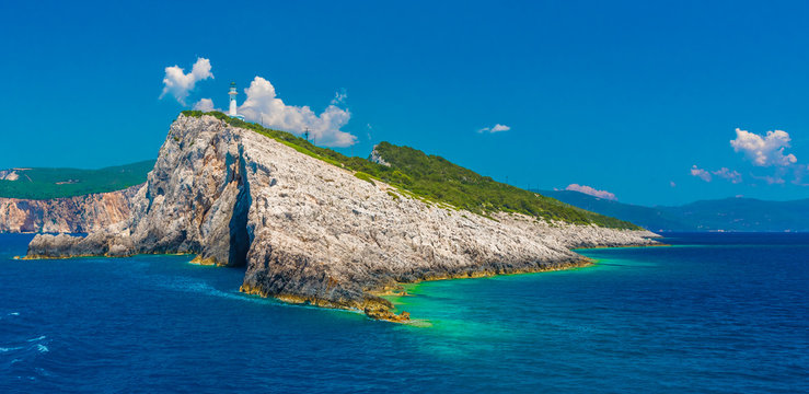 Blue sea and old Lighthouse at Lefkada islands, Greece.