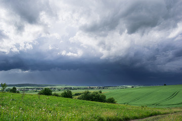 Approaching summer storm in the field