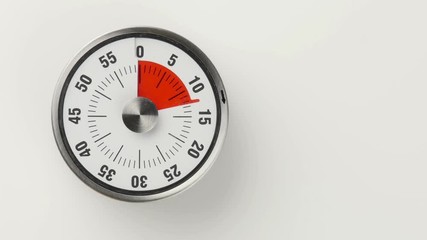 Vintage analog kitchen countdown timer, 15 minutes in 20 seconds time lapse shot