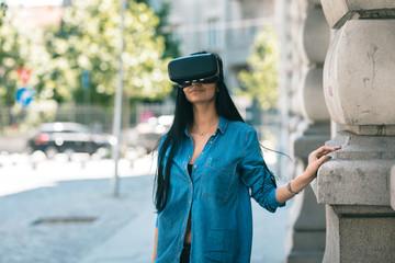 Game developer testing new game with help of VR headset, controlling game by playing into it. New...