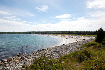 Busy beach on a hot summer day in Nova Scotia, Canada, editorial 