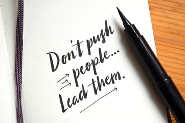 DON’T PUSH PEOPLE. LEAD THEM. hand-lettered in notebook