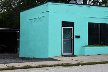 Fototapeta na wymiar Bright turquoise building