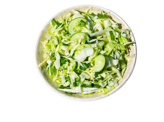 Spring vegan salad with cabbage, cucumber, green onion and parsley isolated on white background