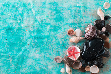 Vacation concept with starfish ,seashells on blue water,summer holiday concept