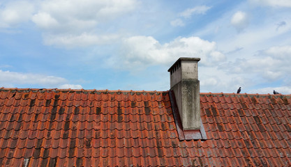 Roof tiles and blue sky