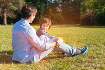 Fototapeta premium Inspiring young family spending the day in the park