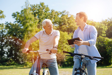 Imaginative organized man sharing his plan with dad