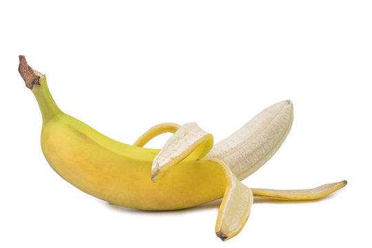 One big opened ripe yellow banana on a white background