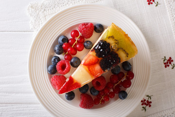 delicious piece of fruit cake jelly close-up on a plate. Horizontal top view