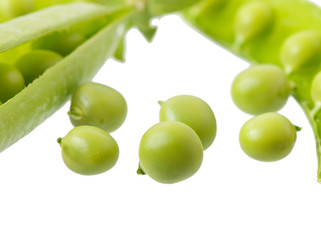 Sweet green peas isolated on white background.