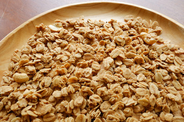 Granola in wooden plate