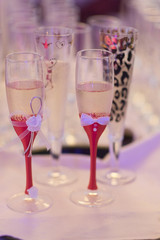 Fancy champagne glasses at wedding time