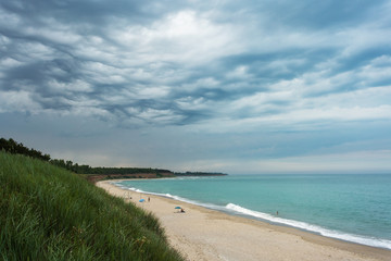 Fototapeta na wymiar Beautiful beach almoste empty with storm clouds in Ezerets, Bulgarya