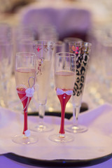 Fancy champagne glasses at wedding time