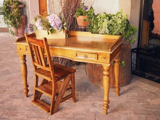 Desk and chair under a porch