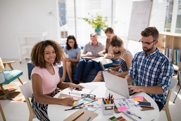 Team of executives working together in the office