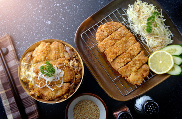 Katsudon or Japanese style fried pork roast .