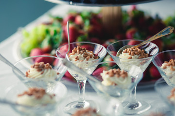 Decorated catering banquet table with different food appetizers assortment on a party
