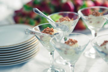 Decorated catering banquet table with different food appetizers assortment on a party
