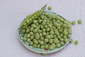 Organic peas. The pea is most commonly the small spherical seed or the seed-pod of the pod fruit Pisum sativum
