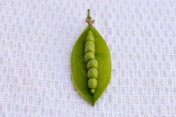 Organic peas. The pea is most commonly the small spherical seed or the seed-pod of the pod fruit Pisum sativum