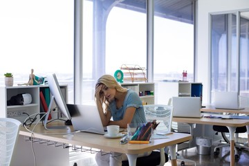 Female executive working at her desk