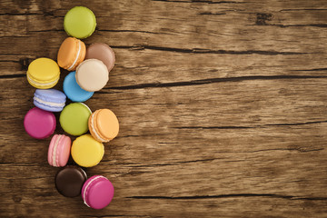 Colorful macaron on wooden table