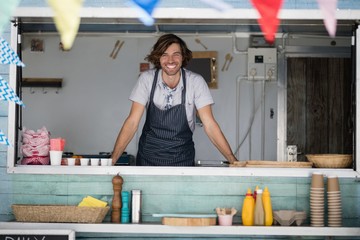 Portrait of waiter smiling