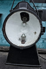 Historic railway lamp with light bulb and spare kerosene lamp and vasp