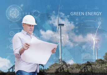 Engineer and a windfarm. Green energy vs oil industry concept