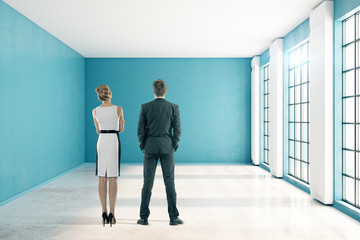 Fototapeta premium Man and woman in blue interior