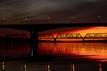 Fototapeta na wymiar Bridge at sunset. Yaroslavl, Russia.