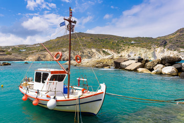 Traditional fishing boat  in Mandrakia village on the coast of Milos island, Cyclades, Greece. © vivoo