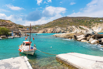 Traditional fishing boat  in Mandrakia village on the coast of Milos island, Cyclades, Greece. © vivoo