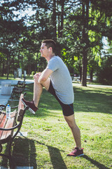 Male Runner Jogging On A Park