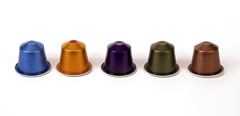 Multi-colored capsules with strong coffee in various angles on a white background