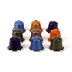 Multi-colored capsules with strong coffee in various angles on a white background