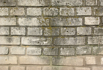 Rough gray brick wall, background, texture