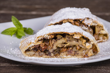 Slice of an apple strudel on a plate