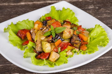 Vegetable stew in plate, close up.