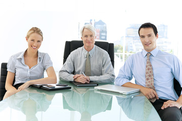 Portrait of business partners in meeting room