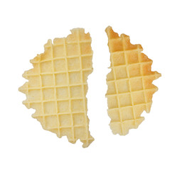 Broken round waffles isolated on white background